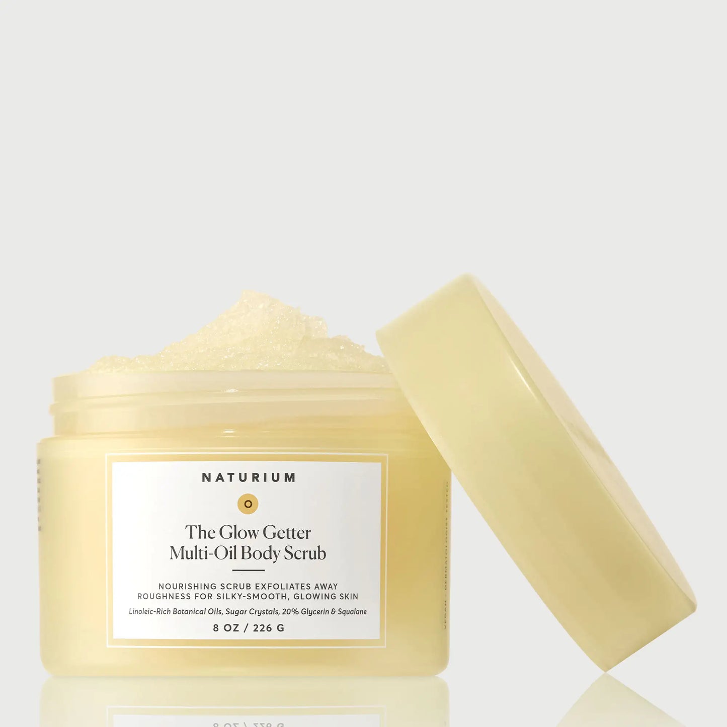 the-glow-getter-multi-oil-body-scrub-w6 NATR-40028-GlowGetter-Multi-Oil-Body-Scrub-Front-CapOff-bonebkgd.webp