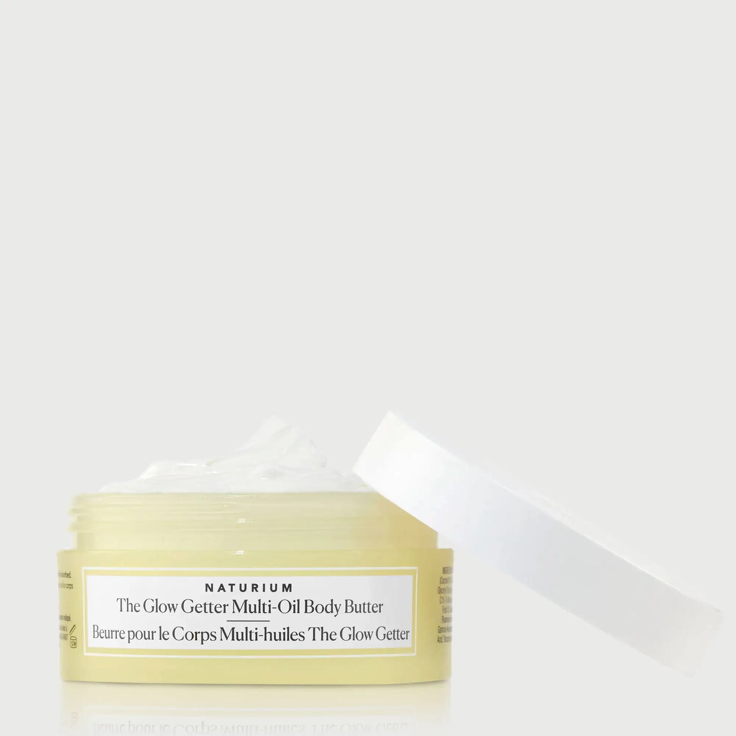 the-glow-getter-multi-oil-body-butter-travel-size-v1 NATR-40115_Glow-Getter-Body-Butter-Mini_front_capoff_bonebkgd.webp