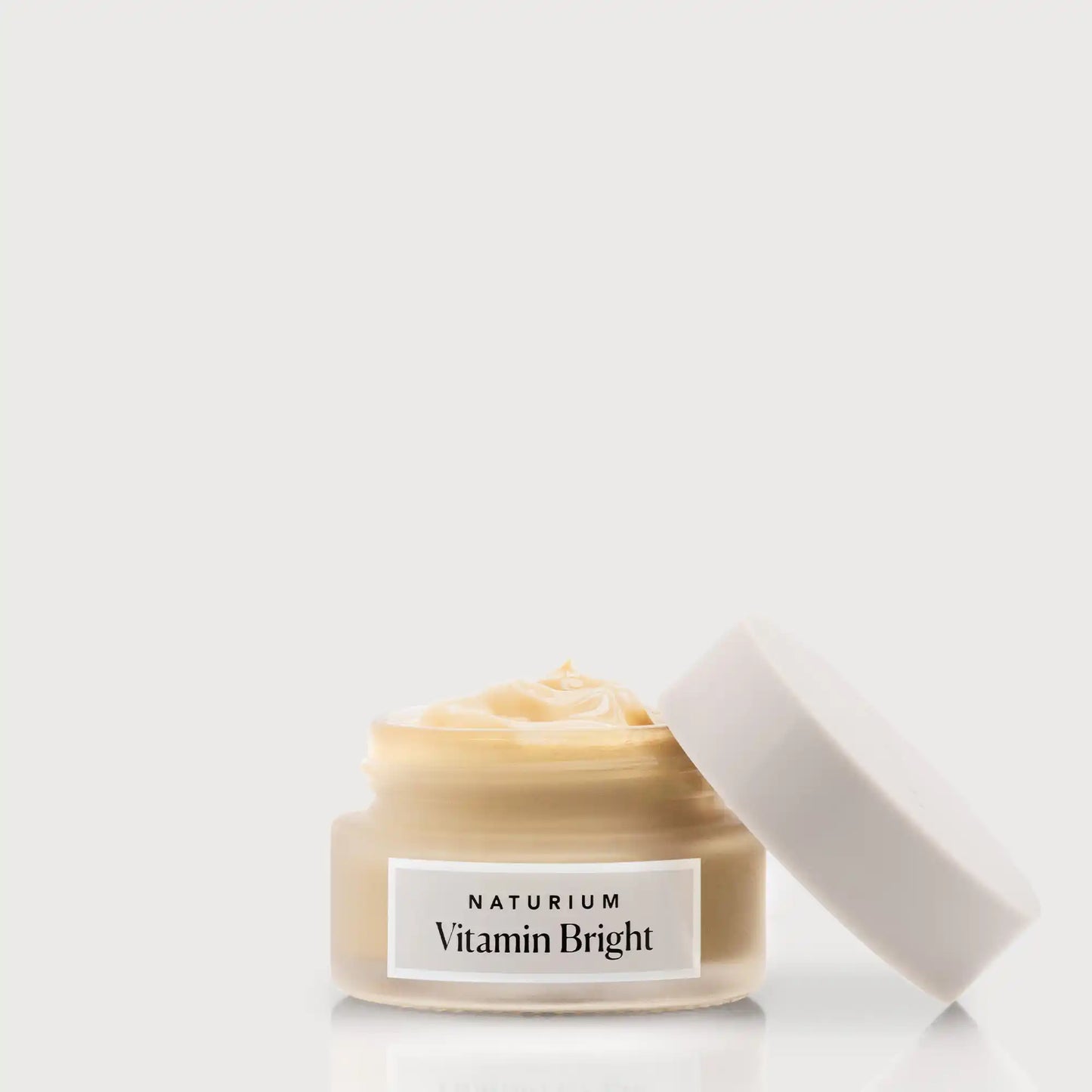 vitamin-bright-illuminating-eye-cream-s8 NATR-VitaminBright_LIGHT_Primary_front_openjar_bone.webp