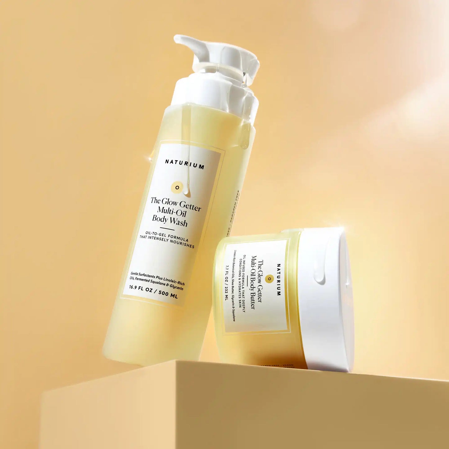 the-glow-all-out-body-bundle-o9 gg-bodybutter_1464-crop_revcolor_FL.webp